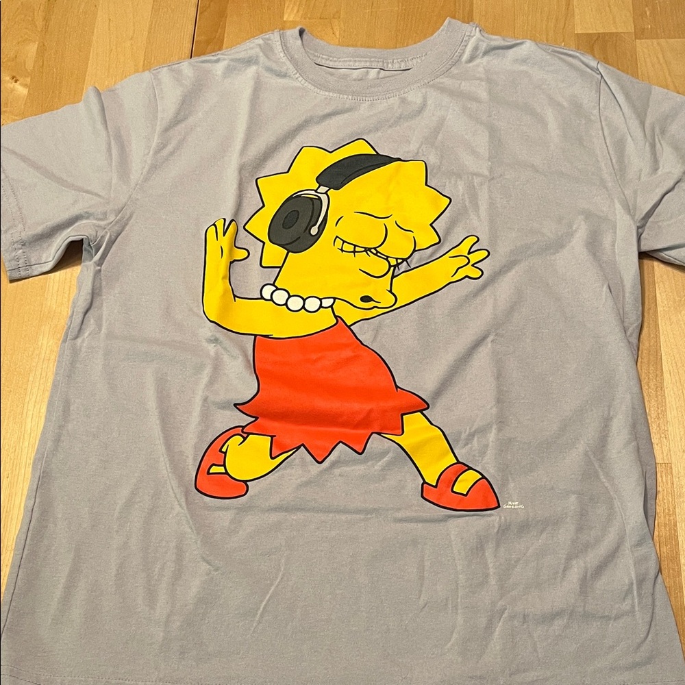 Simpson’s teeshirt, size medium. Lisa with headphones.